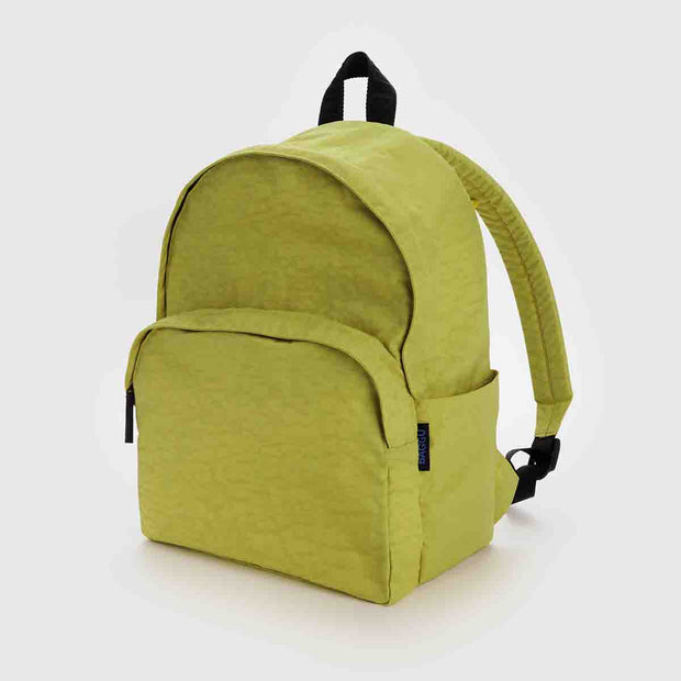 A large recycled nylon backpack from BAGGU in Lemongrass