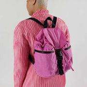 Baggu sport backpack in extra pink worn on a person's back