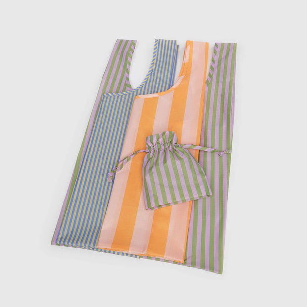 One Hotel Stripes Set of three Standard BAGGU featuring the Tangerine Wide Stripe, Blue Thin Stripe and Avocado Candy Stripe designs laid flat