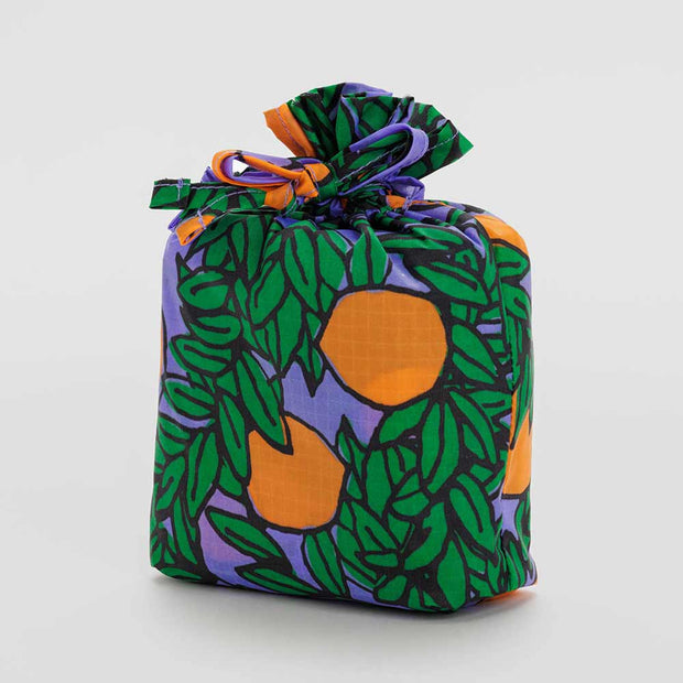 A set of 3 Standard Baggu recycled bags in the Orange Trees designs, including the Periwinkle, Yellow and Coral designs in a drawstring pouch