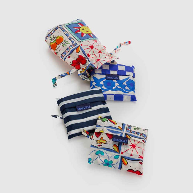 A set of 3 Standard Baggu recycled bags in the Vacation Tiles designs, including the Cherry Tile, Navy Stripe and Sunshine Tile designs