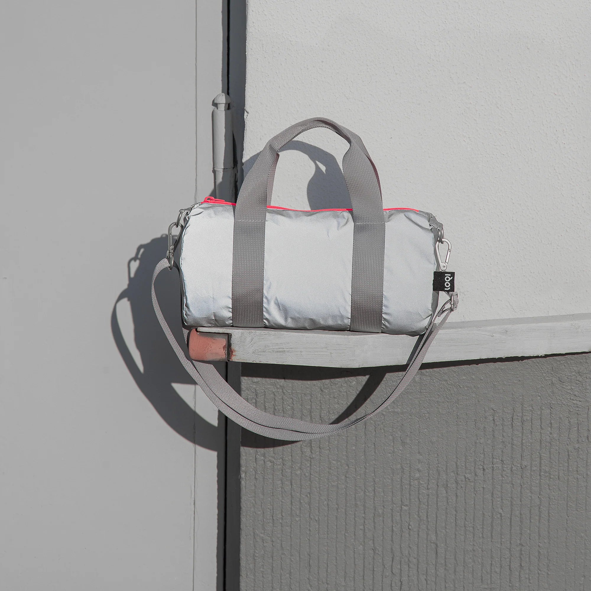 REFLECTIVE Neon Dark Orange Mini Weekender Bag | LOQI | Crossbody Bag