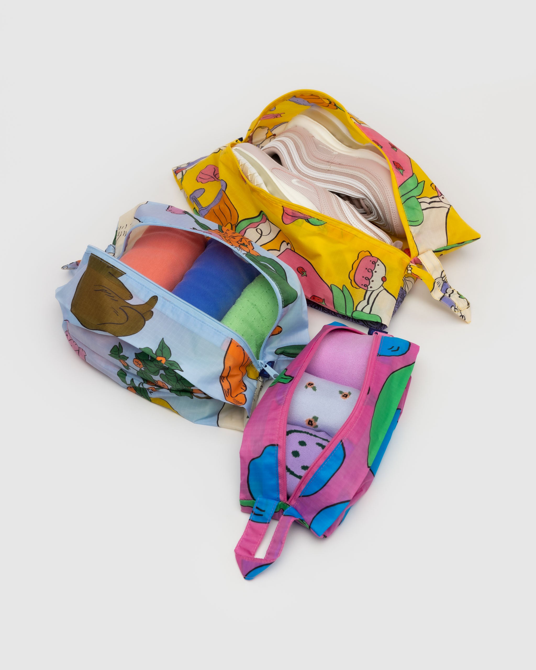 A BAGGU 3D Zip Set in Still Life shown with hobby contents in