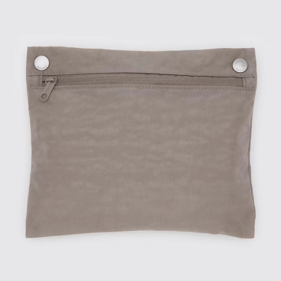 The BAGGU Dove Cloud Bag can be packed into its interior pocket for easy storage.