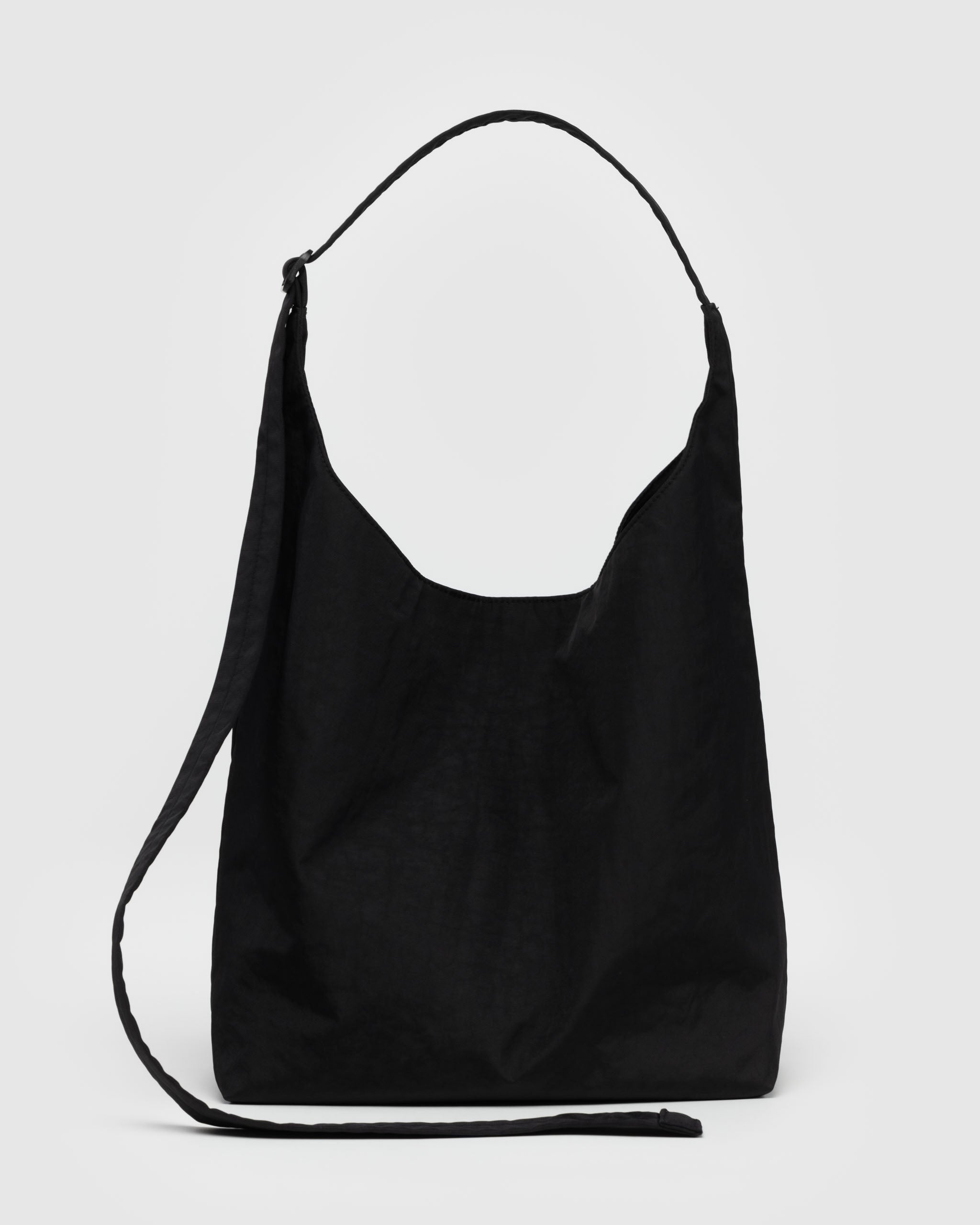 A large nylon sling bag from Baggu in black