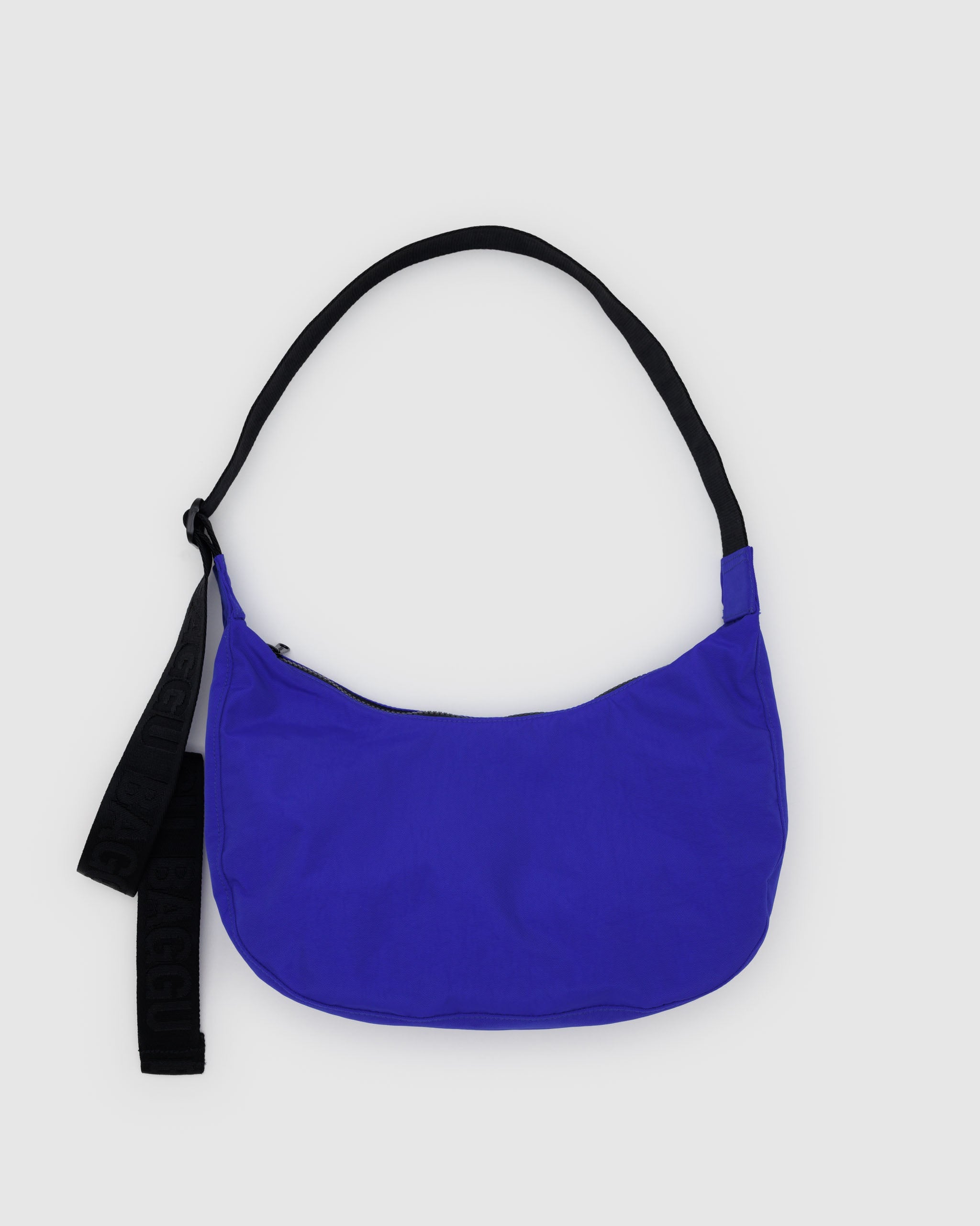 A medium Crescent Bag from BAGGU in Lapis. 