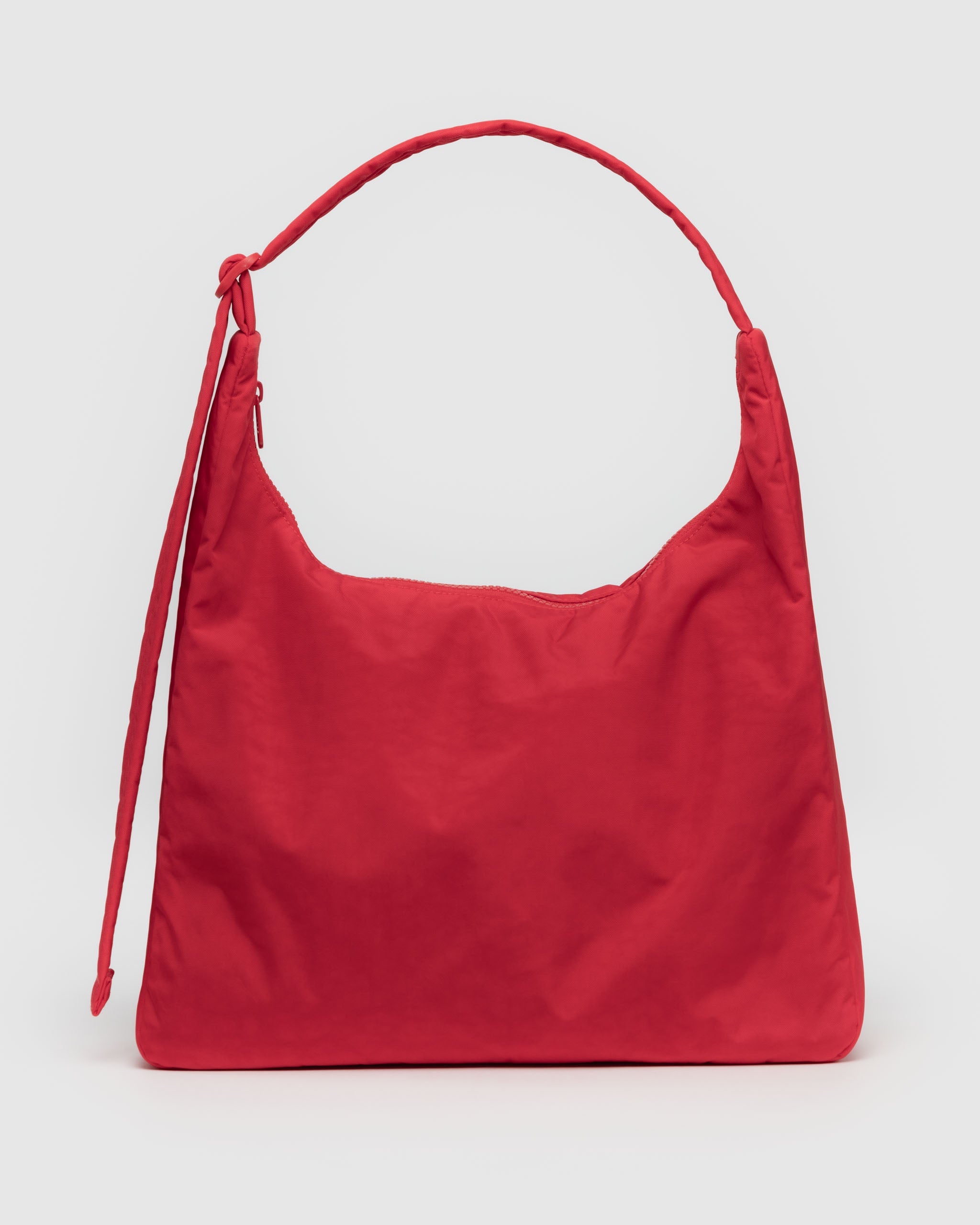 A recycled nylon Shoulder Bag from Baggu in the Candy Apple red colour