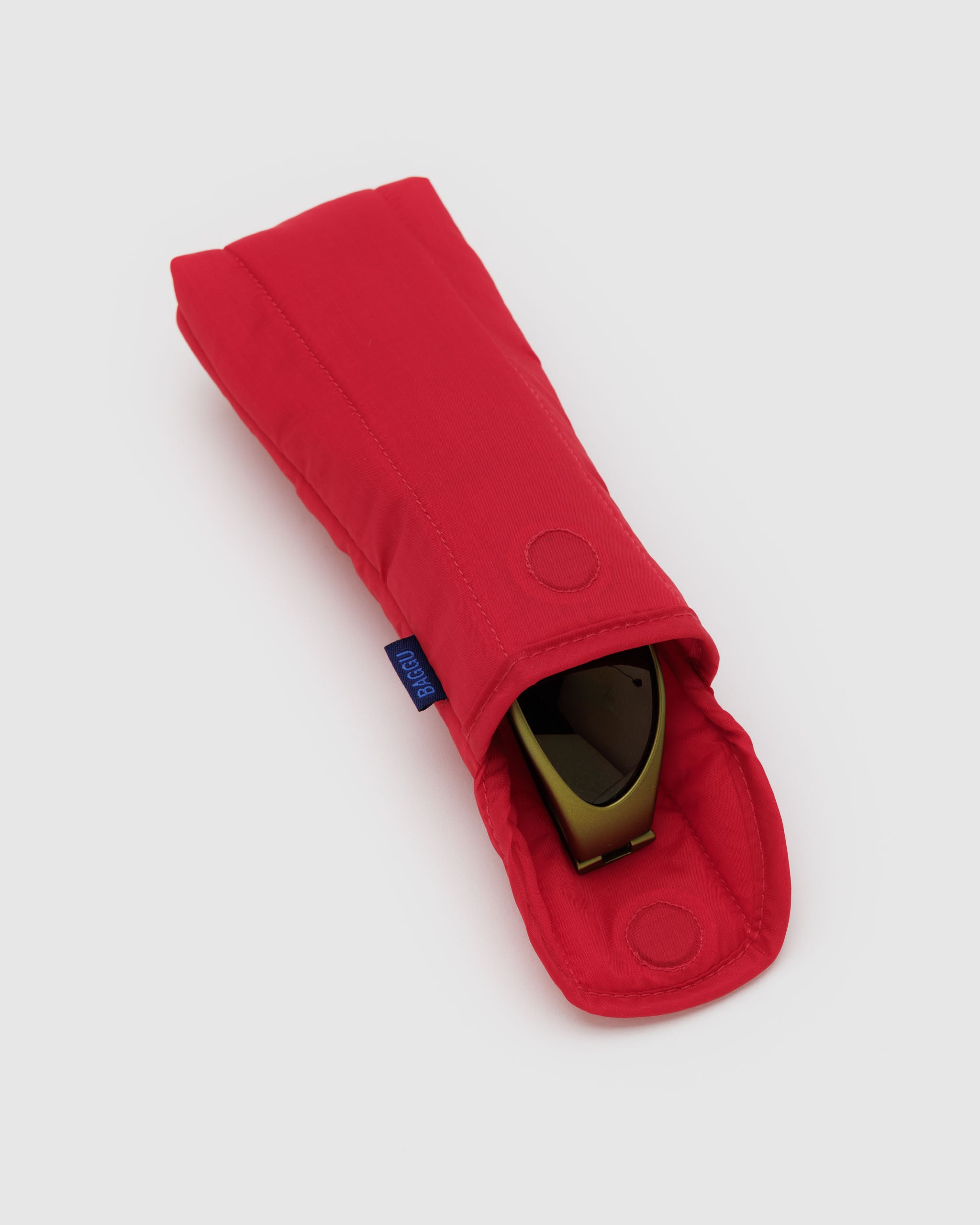 A BAGGU puffy glasses case in Candy Apple