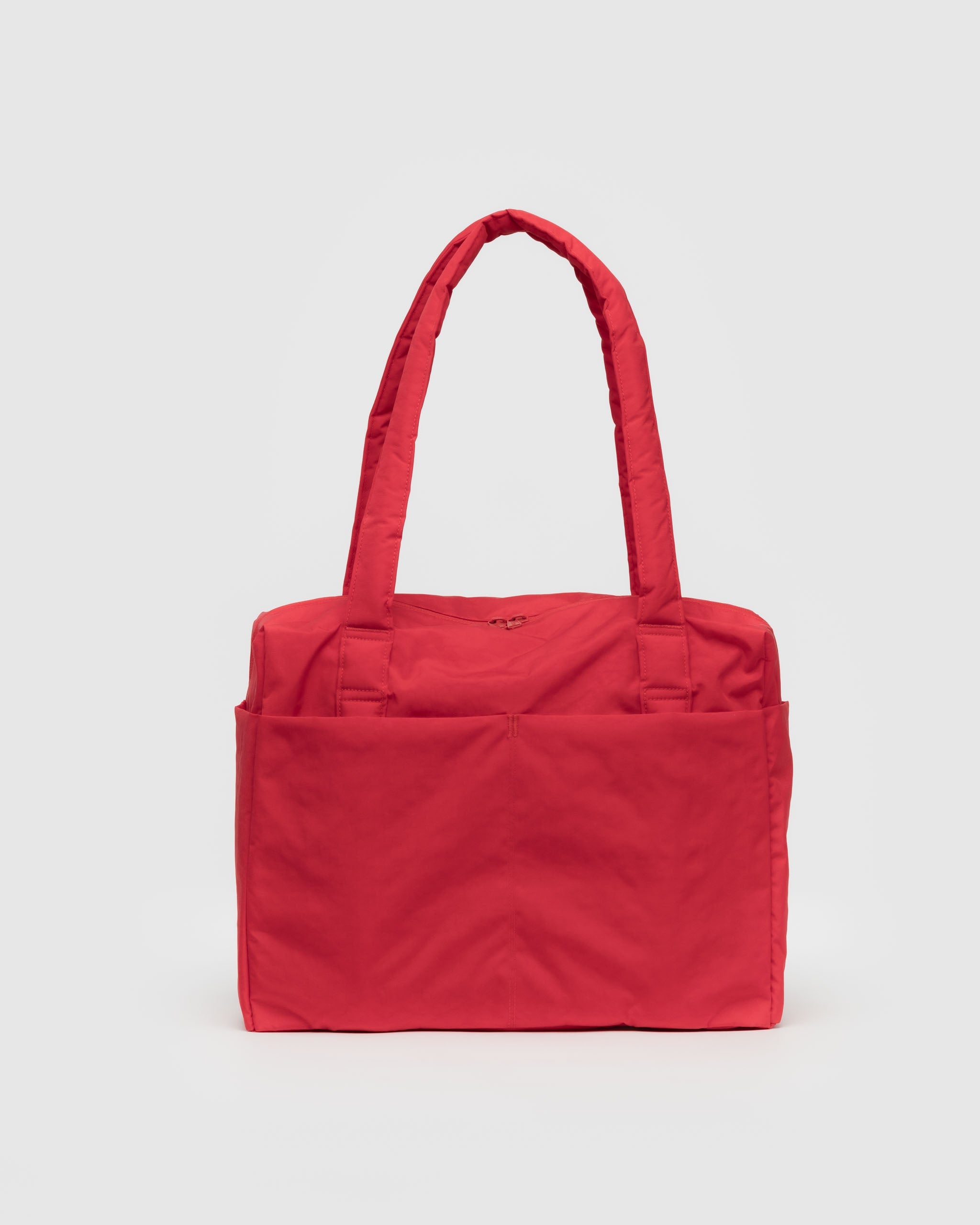 A small Cloud Cary-On bag from BAGGU in Candy Apple Red