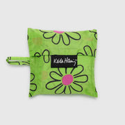 A Keith Haring Flowers design reusable and recycled Baby Baggu in its pouch