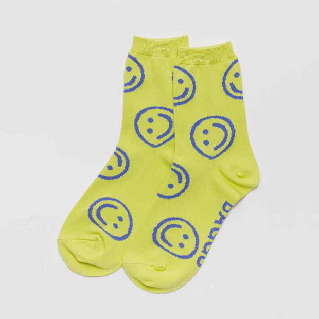 A pair of citron happy Baggu socks