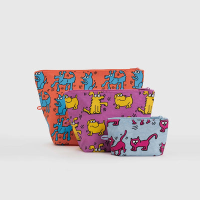 A BAGGU Keith Haring Pets Go Pouch set of three pouches shown zipped up