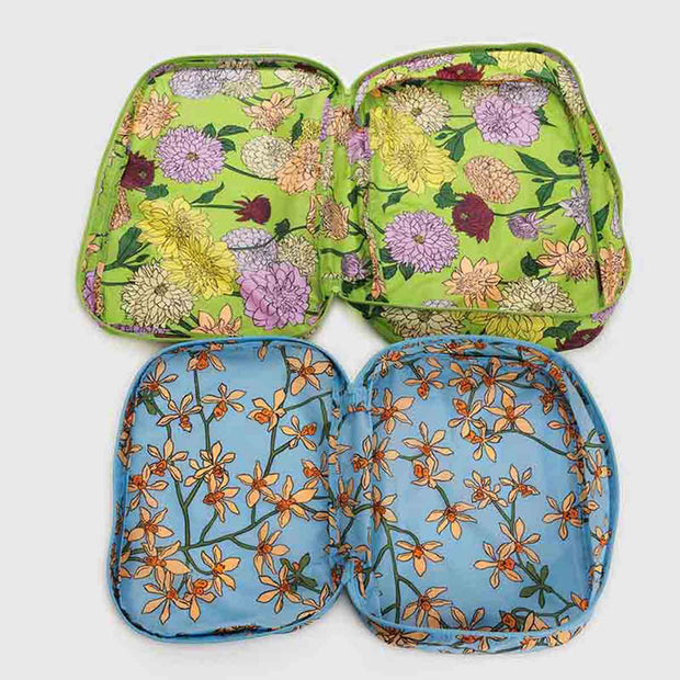 A set of empty Baggu large packing cubes in the Garden Flowers design including Orchid and Dahlia