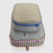 A set of Baggu Hotel Stripes large packing cubes shown closed