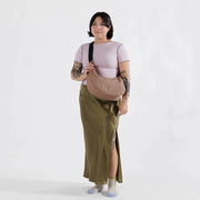 A medium Crescent Bag from Baggu in Cocoa lifestyle image