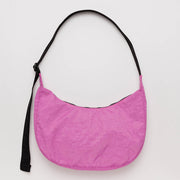 A medium Crescent Bag from Baggu in Extra Pink