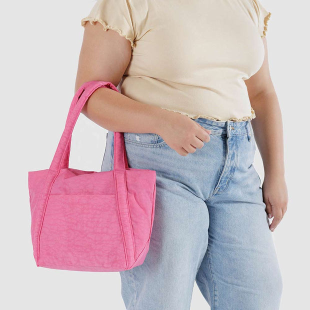 Person holding Baggu Mini Cloud Bag in Azelea Pink