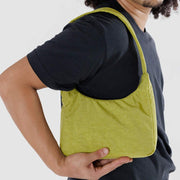 Man with Baggu Mini Nylon Shoulder Bag over shoulder