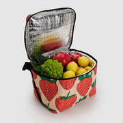 An open Baggu Strawberry Puffy Lunch Bag with produce in it
