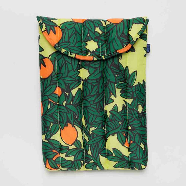 A Baggu Orange Tree Yellow puffy 13/14" laptop sleeve