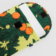 An open Baggu Orange Tree Yellow puffy 13/14" laptop sleeve with a laptop in it