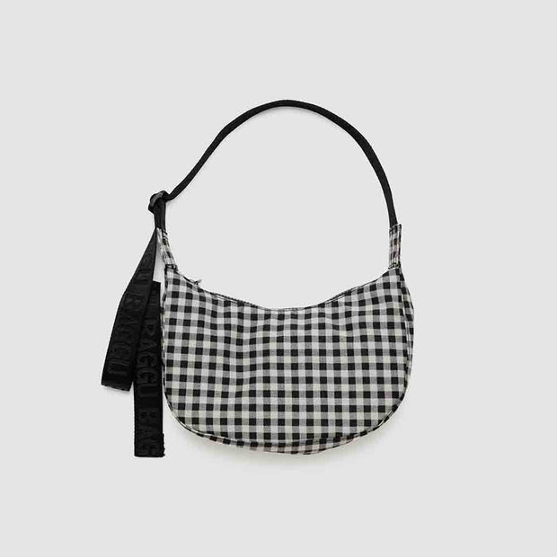 A small Baggu Crescent Bag in Black & White Gingham