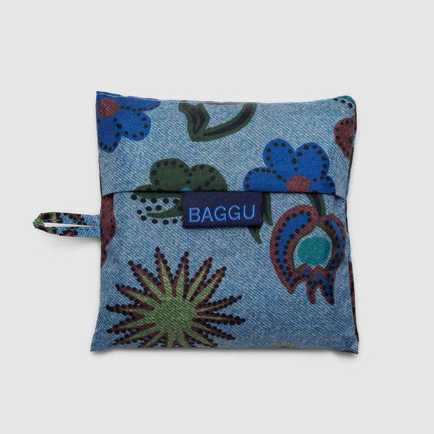 A Baggu Digital Denim Birds standard reusable bag in its pouch