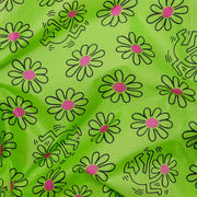 A close up of a Baggu Keith Haring Flowers standard reusable and recycled bag