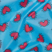 Close up of the Keith Haring Hearts Baggu desig