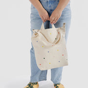 Person holding Baggu Embroidered Hearts Zip Duck Bag 