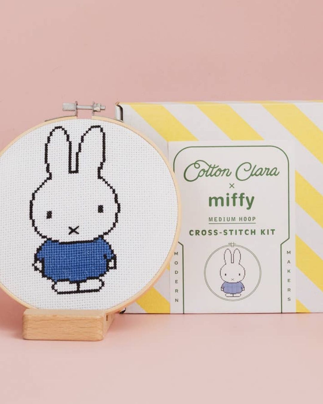A cross-stitched Miffy bunny in an embroidery hoop.