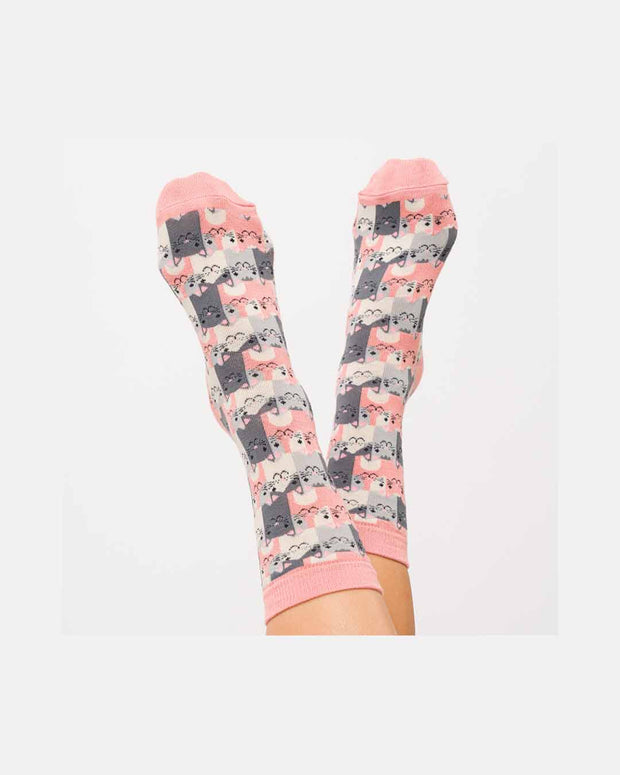 A pair of Miss Sparrow Happy Cat socks with over lapping pink and grey repeated cat pattern