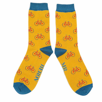 Mr Heron Men's mustard coloured socks with a repeated cycling pattern