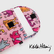 An open Keith Haring puffy laptop sleeve from BAGGU
