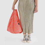 Person holding Red Gingham Standard Baggu