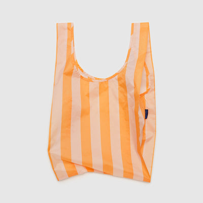 A Baggu Tangerine Wide Stripe standard reusable bag