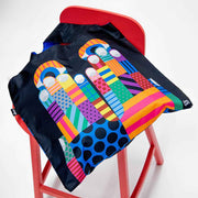 A Don't Look Now Recycled Bag from Craig & Karl shown on a chair