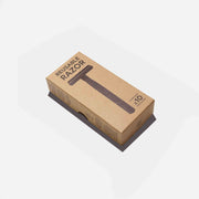 A kraft cardboard plastic free box for the reusable gunmetal grey safety razor